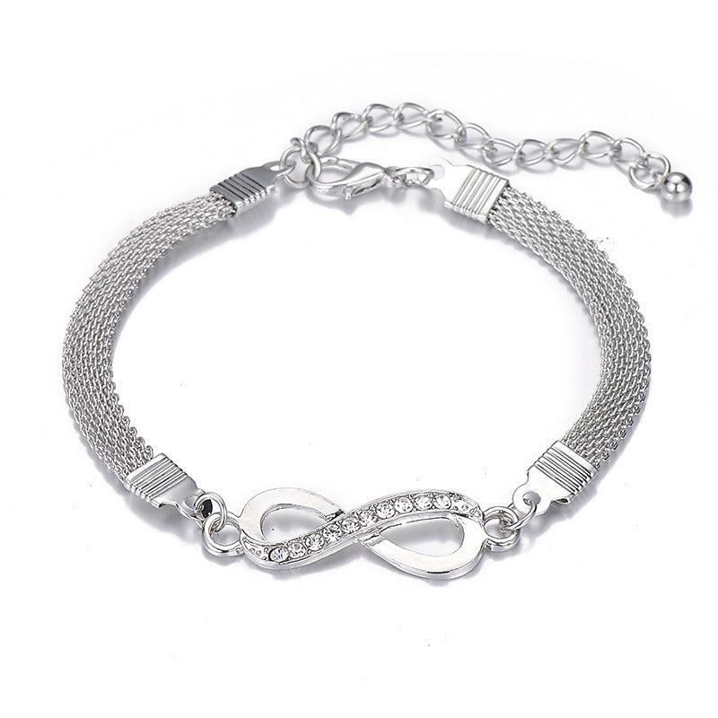 Descubra a sofisticação da Pulseira Infinito Crystal. Um acessório unissex em 8 Shape, perfeito para um estilo elegante e moderno. Com cristais delicadamente incrustados, esta pulseira é a escolha ideal para quem busca um toque de glamour versátil. Adquira já essa joia exclusiva e eleve seu estilo a novas alturas.