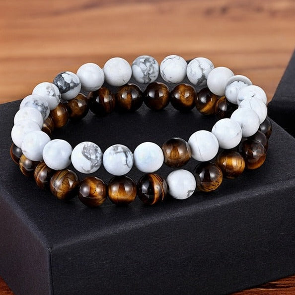 Descubra a Pulseira de Distância em Pedra Natural. Perfeito para Casais e Amigos que desejam manter uma conexão, não importa a distância. Design Unissex, Pedra Natural de 8mm, Estilo Trendy. Um Presente Ideal para Aniversário, Natal e Ocasiões Especiais. Sinta a magia e a conexão com este Conjunto de Pulseiras Elegante