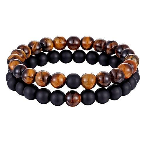 Descubra a Pulseira de Distância em Pedra Natural. Perfeito para Casais e Amigos que desejam manter uma conexão, não importa a distância. Design Unissex, Pedra Natural de 8mm, Estilo Trendy. Um Presente Ideal para Aniversário, Natal e Ocasiões Especiais. Sinta a magia e a conexão com este Conjunto de Pulseiras Elegante