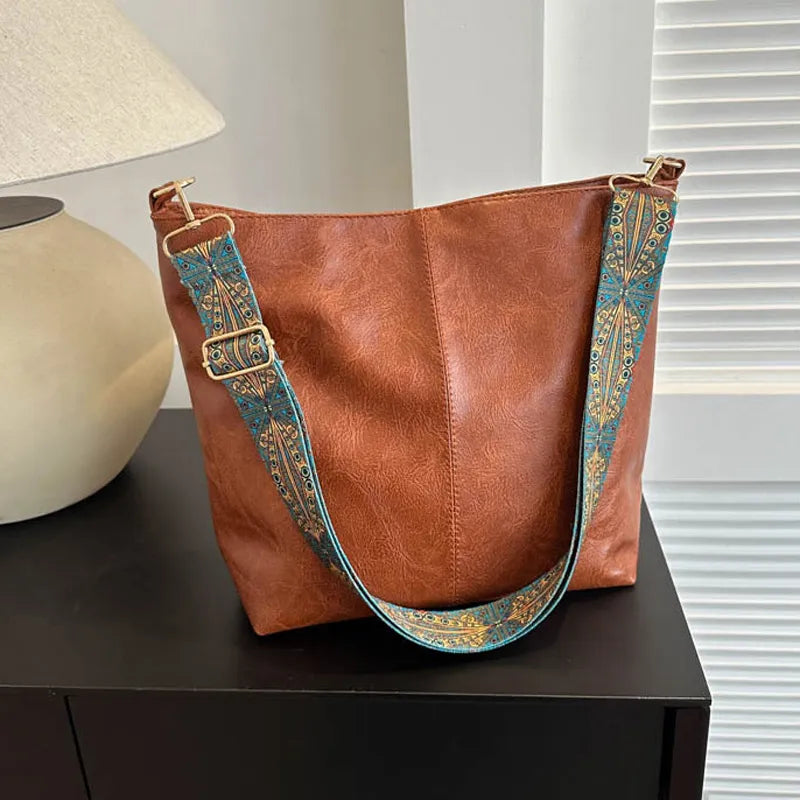 Explore o luxo da Bolsa Elegance, uma combinação de sofisticação e praticidade. Com espaçoso design em Couro, essa bolsa glamourosa é perfeita para seu estilo diário. Desfrute do glamour em cada detalhe com esta Bolsa Espaçosa e Versátil, ideal para shopping, viagem e muito mais. Aproveite Frete Grátis!